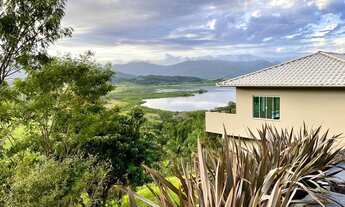 Imagem: Casa com vista para lagoa do coração à