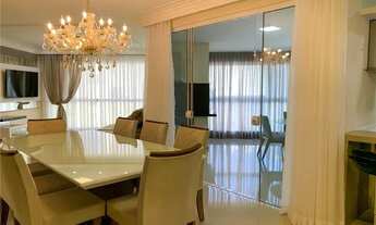 Imagem 2: Desfrute do luxo e da vista incrível do mar no coração de Itapema - Apartamento de 3 suíte