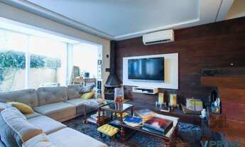 Imagem 1: Casa com 327m² de área privativa, oferecendo 3 dormitórios, sendo 3 suítes