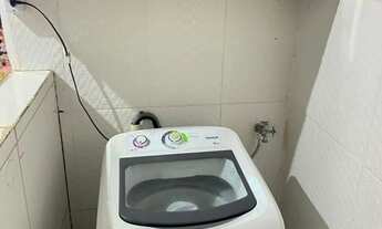 Imagem 7: Casa aconchegante com varanda e quintal