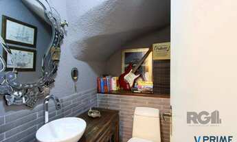 Imagem 6: Casa com 327m² de área privativa, oferecendo 3 dormitórios, sendo 3 suítes