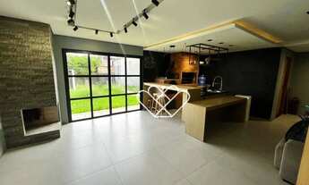 Imagem 6: Casa com 2 Dormitórios, Área de Lazer com Churrasqueira e Lareira: Conforto e Estilo para