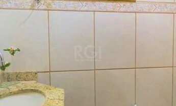 Imagem 5: Casa de 103m² - 3 dormitórios, 1 suíte, churrasqueira, pátio e 2 vagas de garagem no bairr