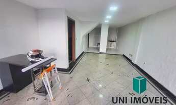 Imagem: Sala comercial com pavimento superior para