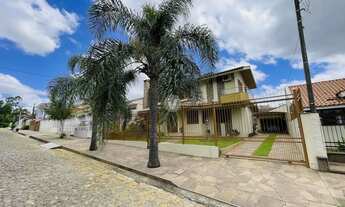 Imagem: Casa 04 dormitórios com uma suíte no bairro