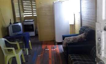 Imagem 3: Terreno com chalé de madeira