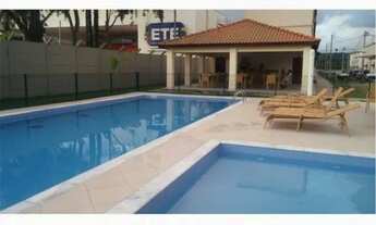 Imagem: Apartamento reformado com móveis na cozinha