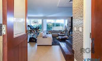 Imagem 5: Casa com 327m² de área privativa, oferecendo 3 dormitórios, sendo 3 suítes