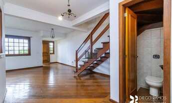 Imagem 5: Ótima casa de 03 dormitórios com suíte, churrasqueira, lareira e sacada, garagem p/4 carro