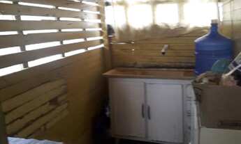 Imagem 4: Terreno com chalé de madeira