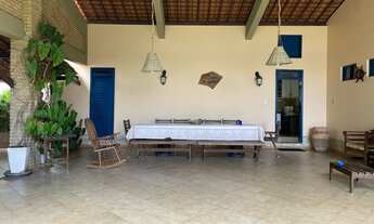 Imagem 5: Casa em frente ao rio vaza barris