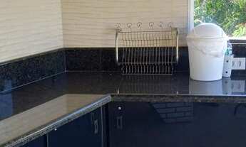 Imagem 6: Casa em Águas de São Pedro. Piscina e churrasqueira. Área verde nos fundos. R$ 495 mil