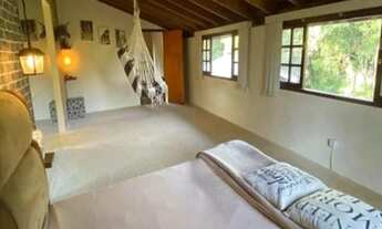 Imagem 7: Casa confortável em condomínio fechado com segurança e portaria 24h Dois quartos sendo suí