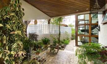 Imagem 6: Casa de condomínio para venda possui 458 metros quadrados com 4 quartos