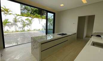 Imagem 5: Casa de condomínio térrea para venda tem 307 metros quadrados com 4 quartos