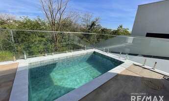 Imagem 2: Casa de condomínio térrea para venda tem 230 metros quadrados com 3 quartos