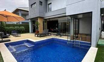 Imagem 7: Casa com piscina e varanda Gourmet à venda em Condomínio de Alto Padrão