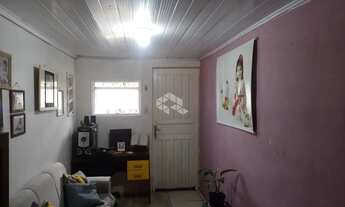 Imagem 3: Casa com 2 quartos toda gradeada com vaga de garagem no Bairro Diácono Luiz Pozzobon em Sa