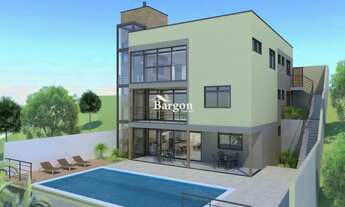 Imagem 2: Casa com 4 quartos sendo 2 suítes e 2 vagas de garagem a venda no Bairro Novo Horizonte em