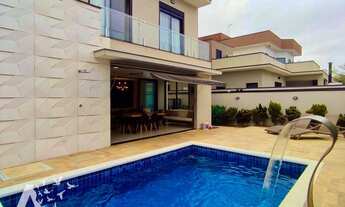 Imagem 2: Sobrado a venda no condomínio Veredas, 3 suítes, quintal com piscina e espaço gourmet, 4 v