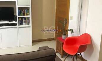 Imagem 3: Casa com 03 dormitórios, 01 suíte, pátio com churrasqueira e 03 vagas de garagem no bairro