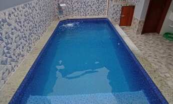Imagem 5: Casa com piscina e churrasqueira