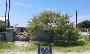 Imagem 4: Casa na praia com amplo espaço de terreno