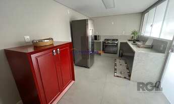 Imagem 6: Apartamento de três quartos, suíte e uma vaga de garagem no bairro Independência em Porto