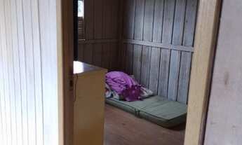 Imagem 3: Terreno com casa de madeira