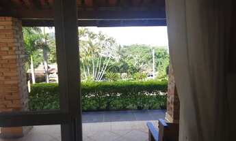 Imagem 7: Casa de condomínio para venda com 3 dormitórios, piscina e belo jardim