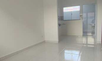 Imagem 2: Casa de condomínio com 2 quartos, ambientes integrados, 1 vaga de garagem e quintal pequen