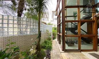 Imagem 7: Casa de condomínio para venda possui 458 metros quadrados com 4 quartos