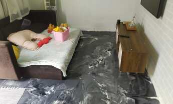 Imagem: Casa de laje tampada com telha de zinco