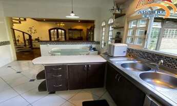 Imagem 4: Casa confortável em condomínio fechado com segurança e portaria 24h Dois quartos sendo suí