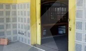 Imagem 5: Salão comercial com 2 banheiros e porta de aço