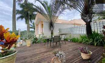 Imagem 3: Casa de condomínio para venda possui 458 metros quadrados com 4 quartos