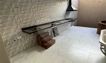 Imagem 5: Encantador Sobrado com 3 Dormitórios e 3 Suítes na Vila Carrão: Elegância e Conforto em Ca