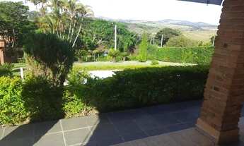 Imagem 5: Casa de condomínio para venda com 3 dormitórios, piscina e belo jardim