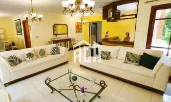 Imagem 4: Elegância e Conforto no Alpha 9 Casa com 4 Suítes, Piscina e Espaço Gourmet