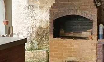 Imagem: Casa com 4 quartos à venda por R$ 890.000