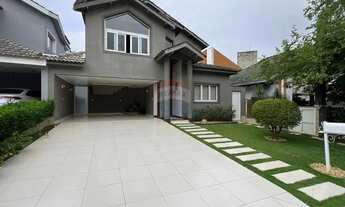 Imagem 2: Casa Condomínio Alphaville 6 com 328,73m², 4 suítes, 6 vagas, próximo a área social do con