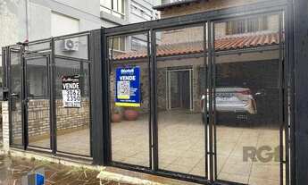 Imagem: Casa de três quartos, suíte e quatro vagas