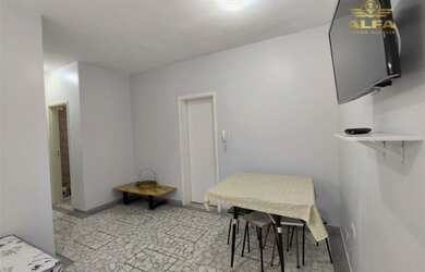 Imagem 3: Apartamento na quadra mar da Praia das Pitangueiras com 2 dormitórios mais dependência Gua