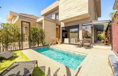 Imagem 2: RR8504 Casa 330m² CONDOMÍNIO GENESIS I - OPORTUNIDADE - 4 Suítes 4 Vagas - Santana de Parn