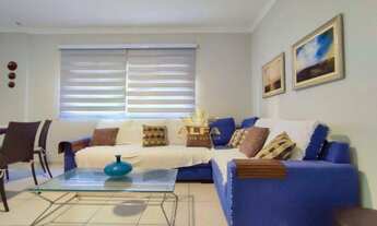 Imagem 4: Apartamento reformado com sacada e vista para o mar da Praia das Astúrias de 2 dormitórios