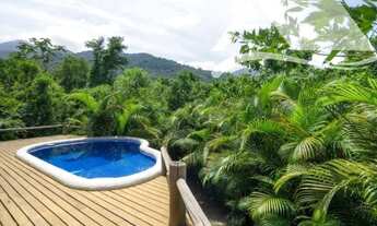 Imagem 3: Casa escritura definitiva, Imersa em cachoeiras e riachos,3 suites, condomínio de fácil ac