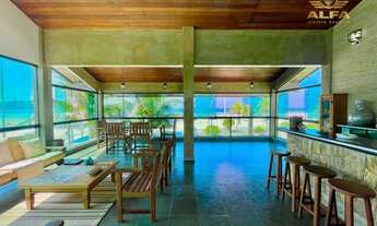 Imagem 2: Casa de frente para o mar com 3 suítes e área de lazer com piscina, churrasqueira e 4 vaga