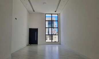 Imagem: Casa linear, sala com pé direito duplo