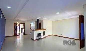 Imagem 4: Casa em Porto Alegre, no bairro Hípica, com 3 dormitório(s), e 3 banheiros, à venda