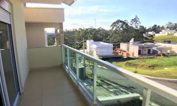 Imagem 5: Casa de condomínio com 225 m², 4 quartos, sala com 3 ambientes, lareira, varanda com churr